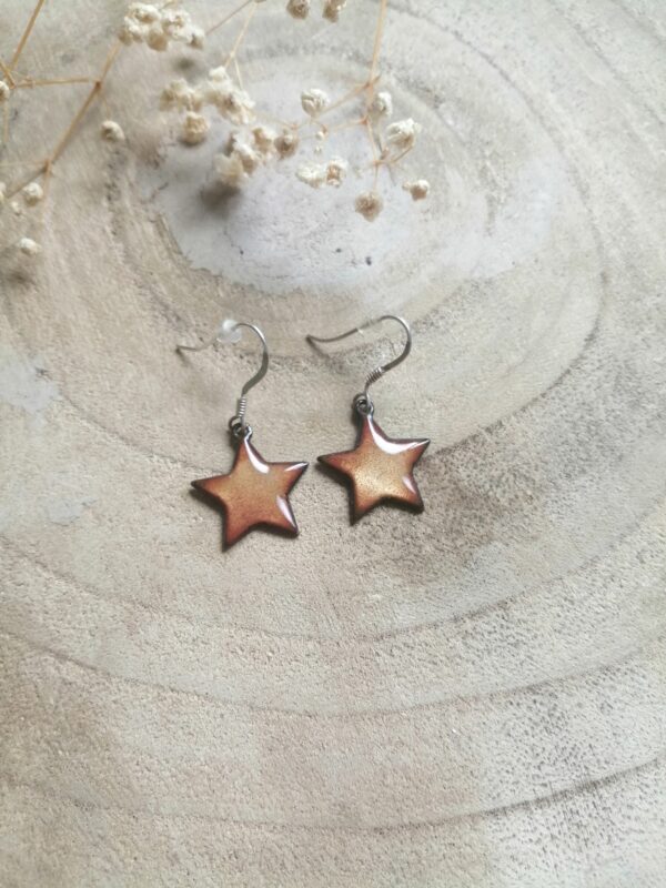 Boucles d'oreilles étoile jaune clair (-40%)