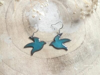 B.O oiseau bleu turquoise